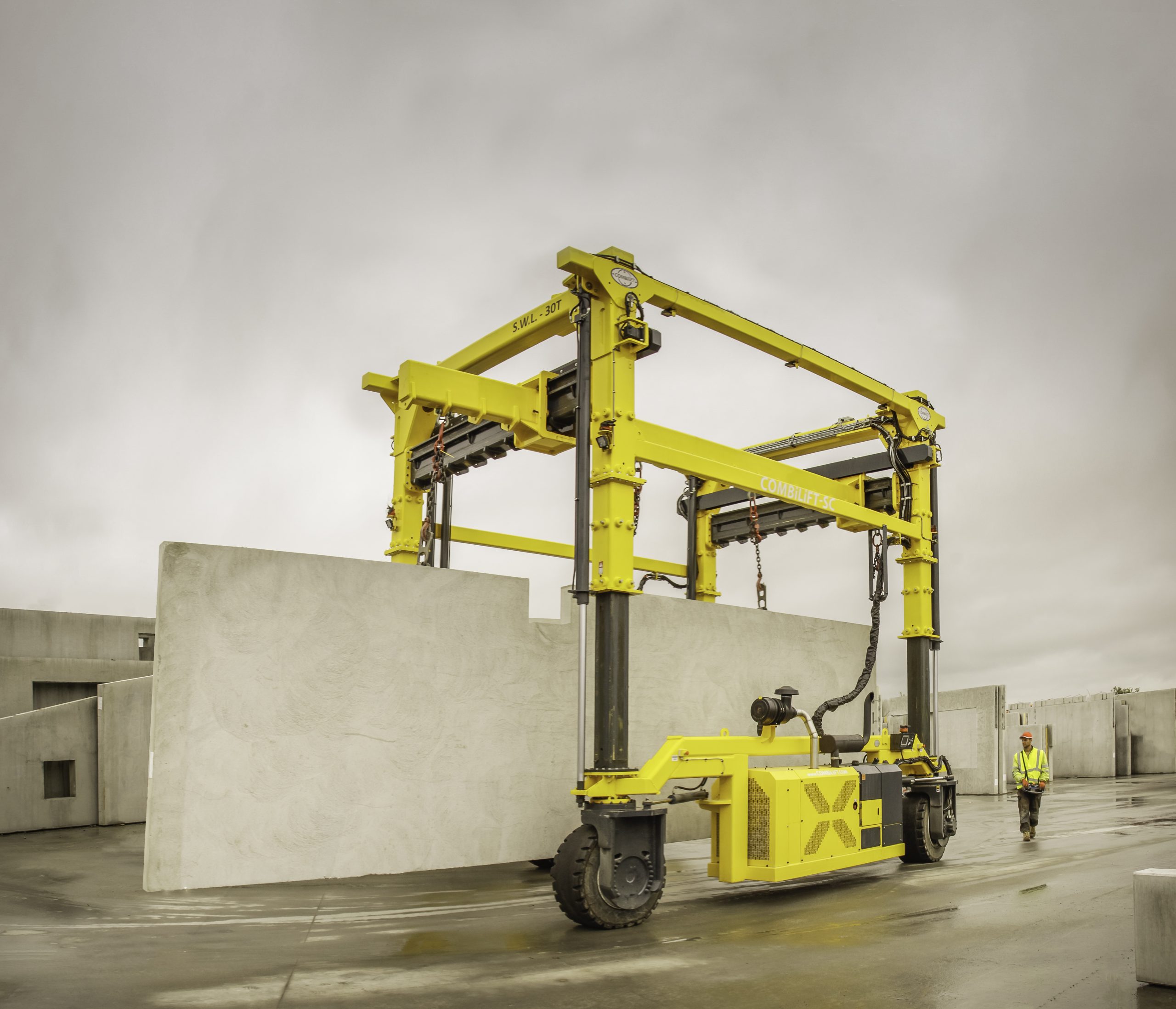 Combilift Telescopic Straddle Carrier lifting concrete casting