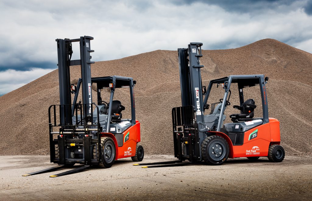2 HELI Lithium Forklift Trucks at the Port of Sutton Bridge in high quality with a good background.