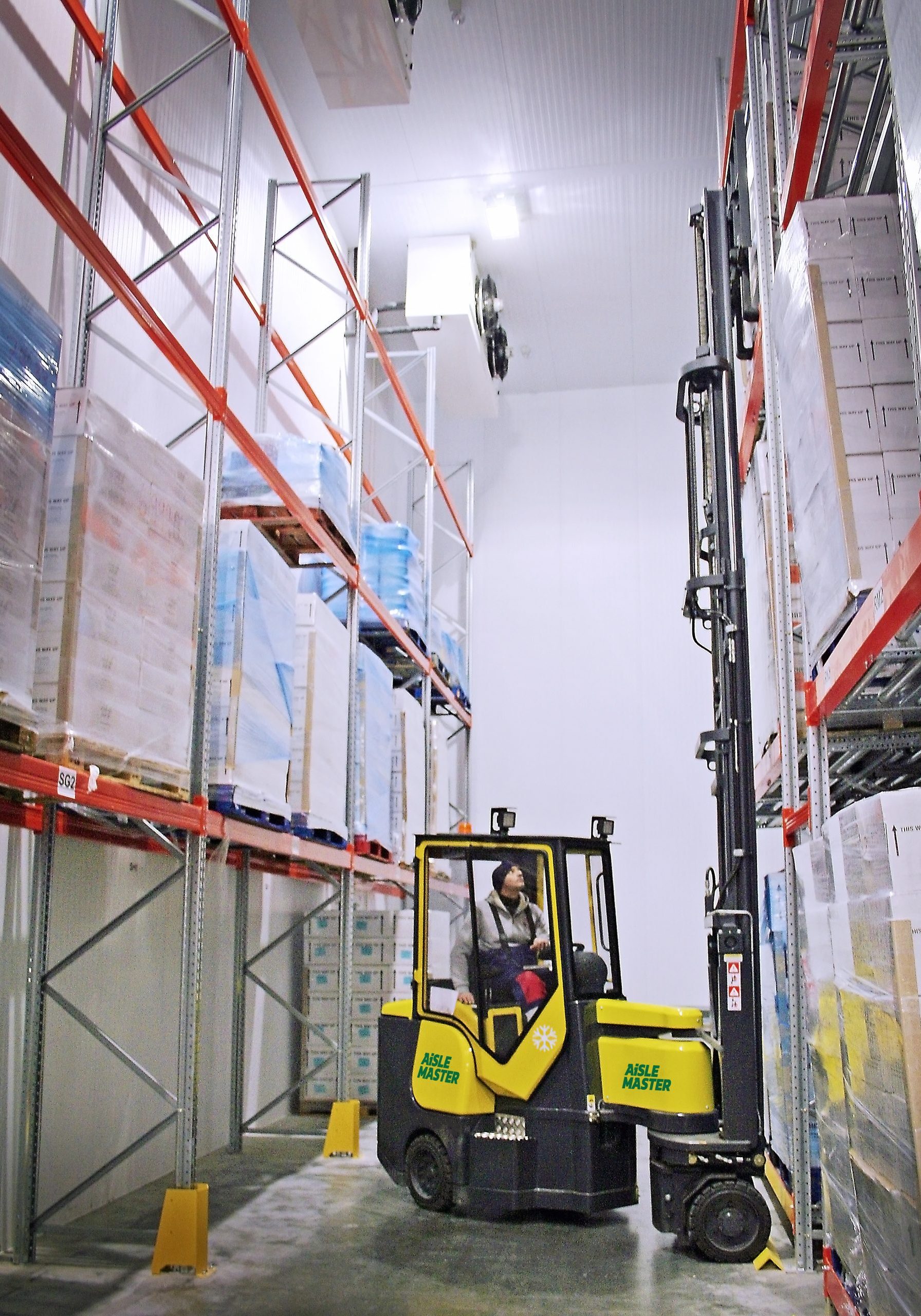 Articulated VNA Combilift Aislemaster Electric Forklift in use