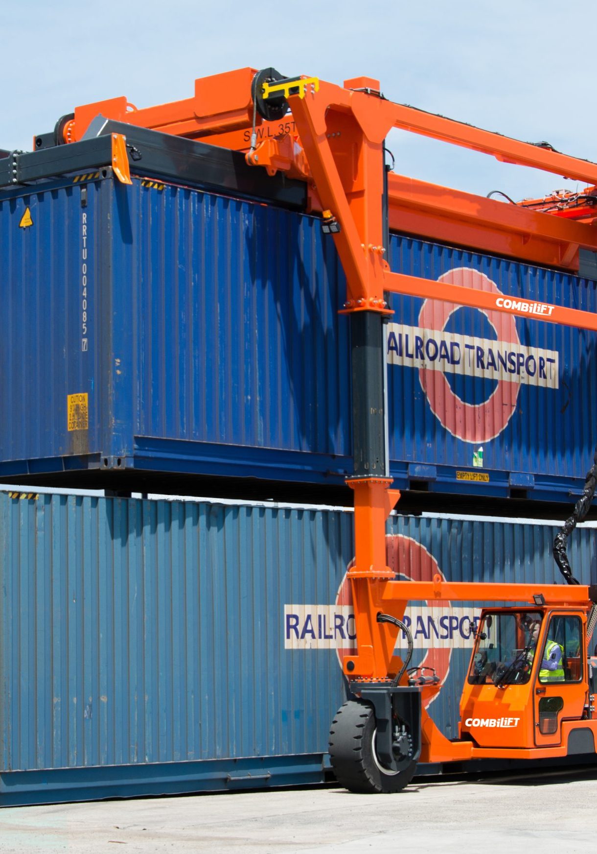 Combilift Stradde Carrier in use lifting containers